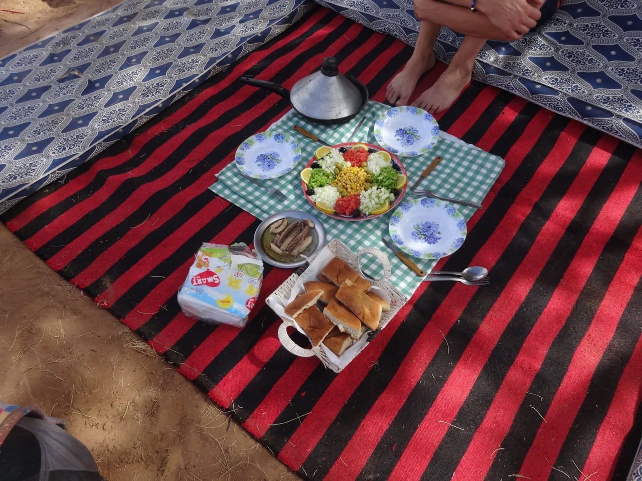 Traditional desert meal on Berber rug